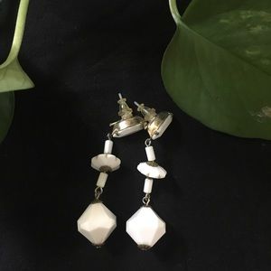 White dangling earrings costume jewelry